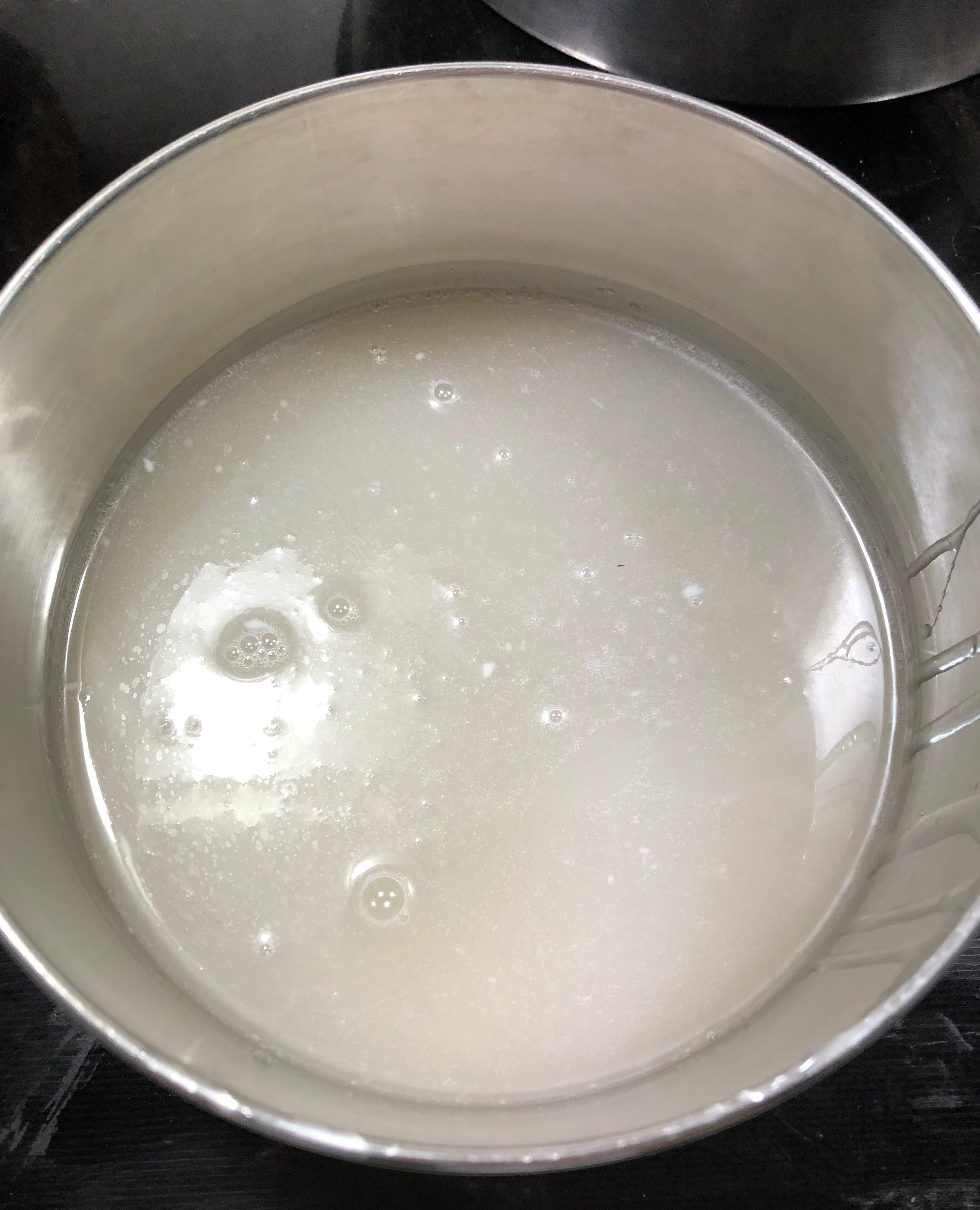 BBN Coconut milk and sugar cooling in metal bowl